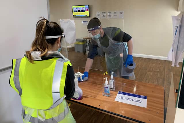 Testing booths are cleaned between each person's test to avoid cross contamination.