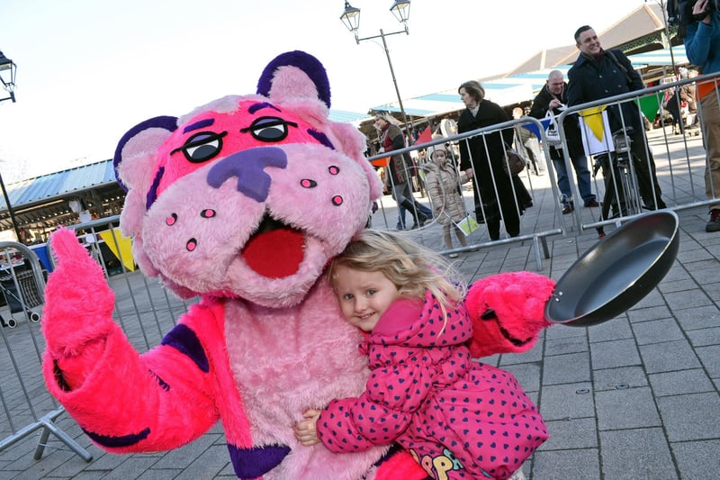 Frenchie Bear, the Frenchgate Centre mascot pictured with Lenny Darrans, three, of Mexborough, during the Pancake Olympics at Doncaster Market Place in 2015