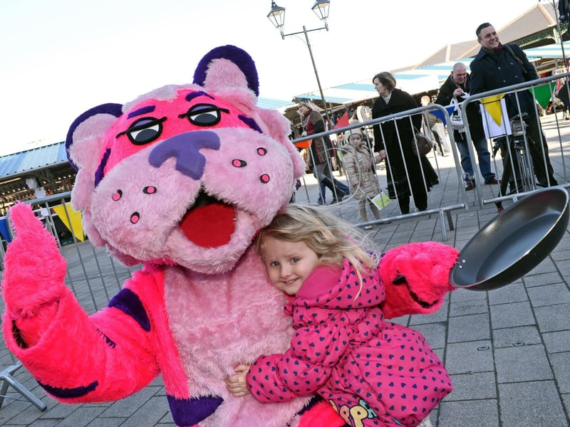 Frenchie Bear, the Frenchgate Centre mascot pictured with Lenny Darrans, three, of Mexborough, during the Pancake Olympics at Doncaster Market Place in 2015