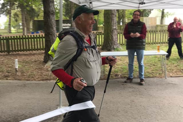 David Huxley crossing the finishing line at Walesby Forest