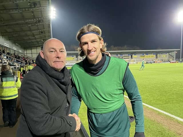Micky Kedian and Mansfield Town FC's Aden Flint.