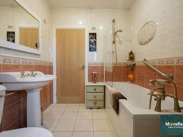 The family bathroom is the perfect place to relax and unwind after a busy day.