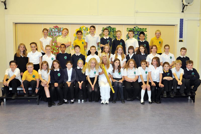 Olympic torch bearer Michele Harrop visited Gateford Park Primary School to show the children her torch, Michele is pictured with class five.