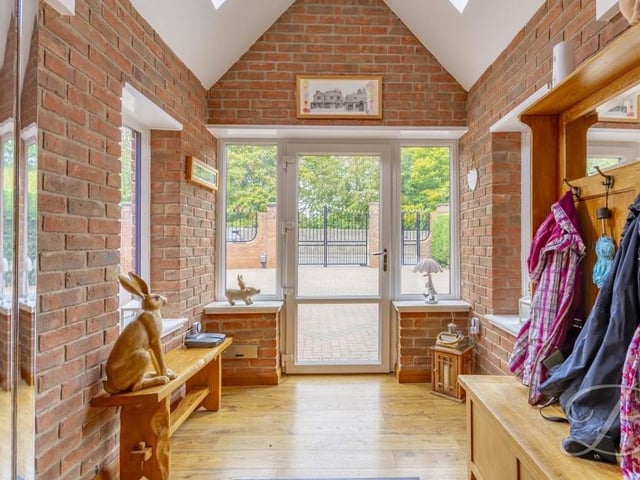Before we nip upstairs, let's take a peek at the entrance hallway, with its veneer flooring, coving and staircase.
