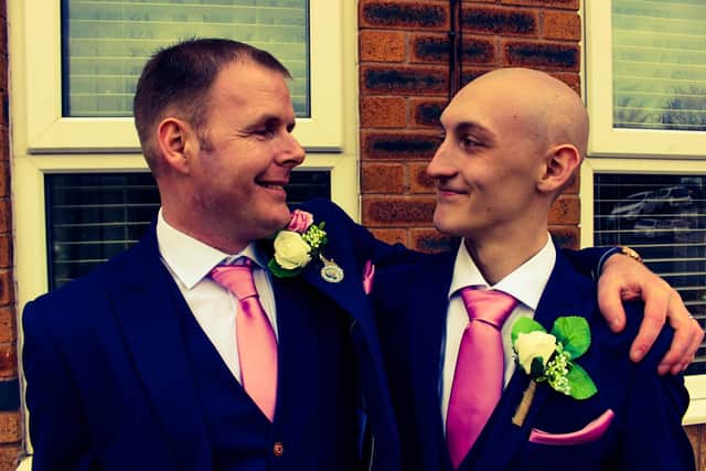 Father and son together at Samantha and Mark's wedding in 2021.