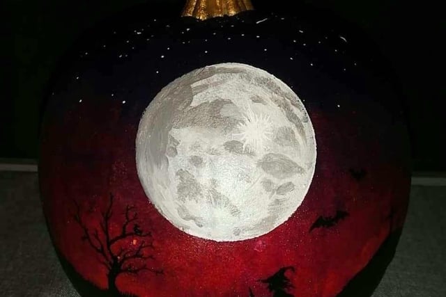 Alison Argent shared this talented submission. She said: "My daughter painted this pumpkin." Well, that is impressive. The scene depicts spooky outlines - including bats and a witch - under the full moon.