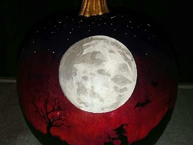Alison Argent shared this talented submission. She said: "My daughter painted this pumpkin." Well, that is impressive. The scene depicts spooky outlines - including bats and a witch - under the full moon.