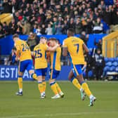 First half goal celebrations for Mansfield Town against Swindon Town on Saturday - Photo by Chris & Jeanette Holloway/The Bigger Picture.media