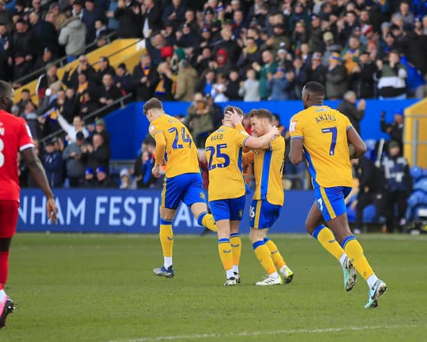 First half goal celebrations for Mansfield Town against Swindon Town on Saturday - Photo by Chris & Jeanette Holloway/The Bigger Picture.media