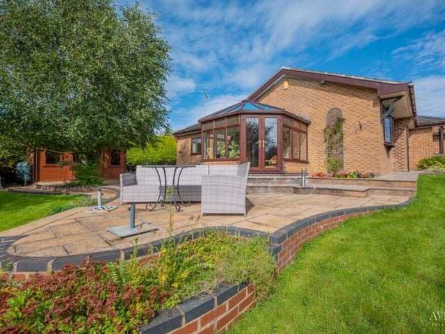 Here is one of two lovely patio seating areas in the garden. Fire up that summer barbecue!