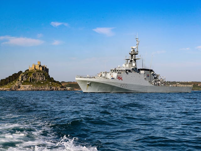 HMS Tamar sailed past Saint Michaels Mount Cornwall whilst conduting sea boat drills.
