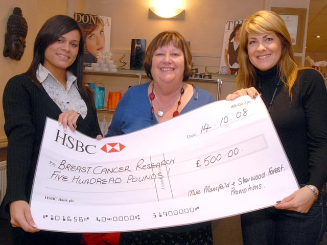 Carole Ibbotson, Nottinghamshire manager for Cancer Research UK, receives a cheque for £500 raised during the year of office for Miss Mansfield and Sherwood Forest Dannyelle Charles, left. Also pictured is Trish Broadhead, promotions manager of Miss Mansfield and Sherwood Forest.
