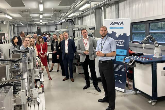 Guests at the launch event were given a tour of the college’s engineering centre by head of department Ben Toule (first right).