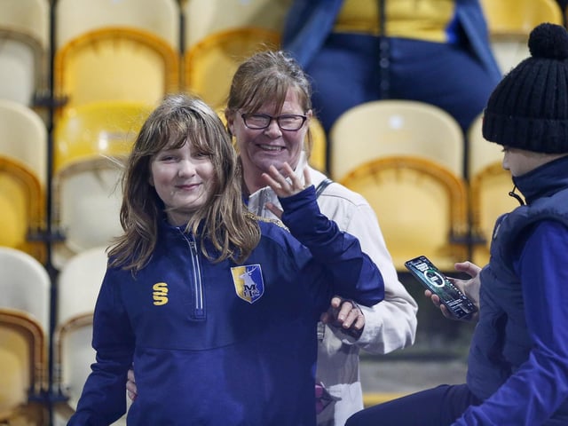 Mansfield Town fans watching the draw with Wrexham.