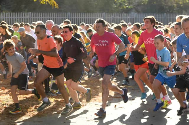 Olympic legend Seb Coe and his son Harry Coe join hundreds of runners at a parkrun. (Photo by Ian Gavan/Getty Images for Vitality)