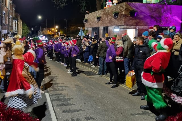 Crowds lined the streets waiting for Santas Sleigh Parade to arrive