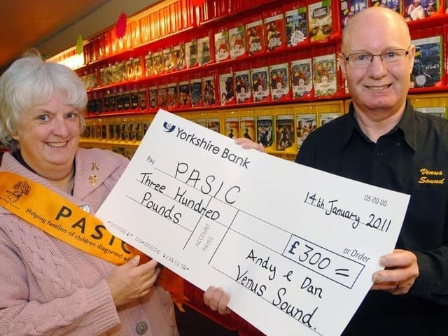 Venus Sound's Andy Collins presented a cheque for £300 from the proceeds of a charity night held at the Bentinck on New Years Eve with his son Dan, to PASIC co-ordinator Bea Brunton, at his shop in Sutton back in 2011.