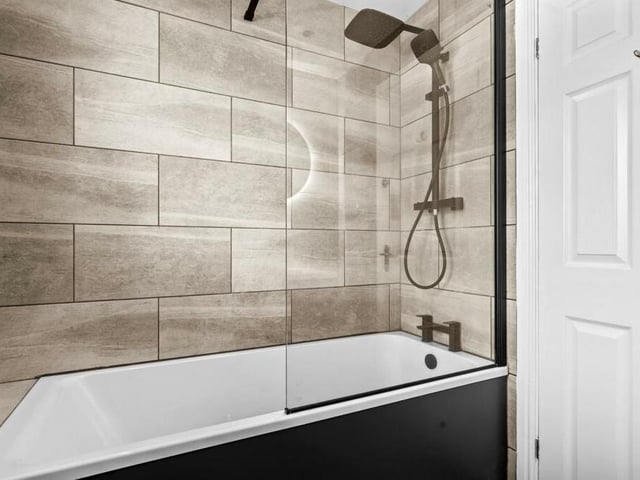 There are two luxurious bathrooms on the first floor of the Studland Close house. This is one of them.