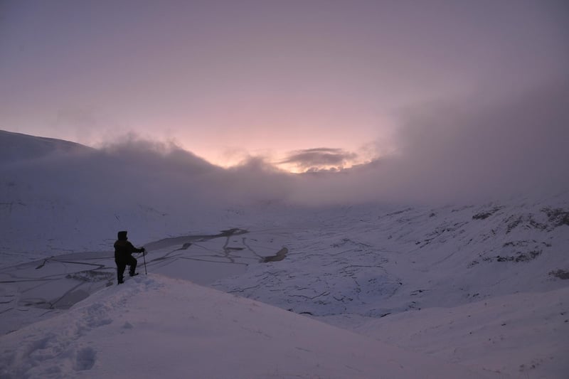 John Lewis Munro caught dawn breaking over a frozen Loch a'Bhealaich in Kintail.