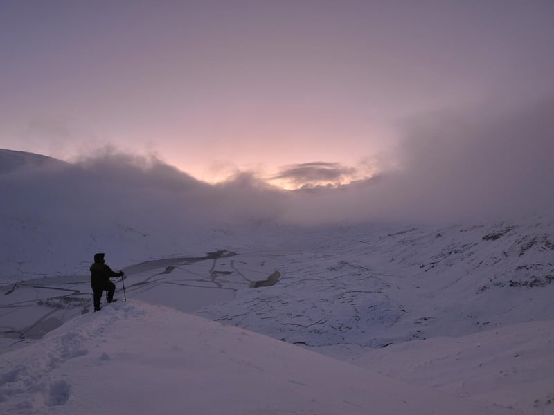 John Lewis Munro caught dawn breaking over a frozen Loch a'Bhealaich in Kintail.