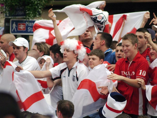 Do you recognise any familiar faces watching England play in the 2002 World Cup ?