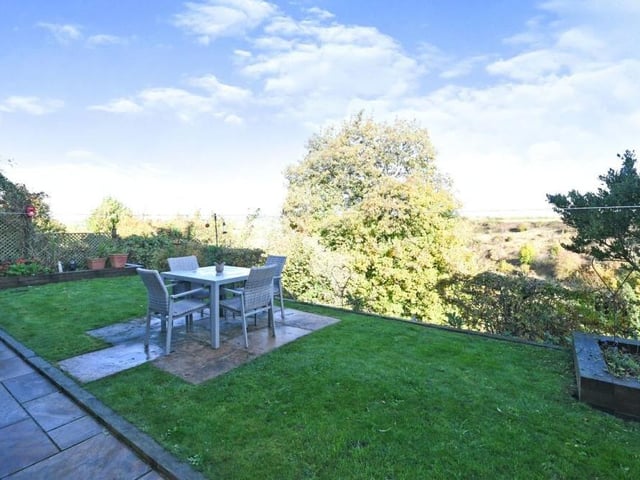 Our photo gallery of the £400,000-plus Kirkby house concludes with this image of the rear garden and a seating area, suitably placed to take full advantage of some spectacular views overlooking the countryside.