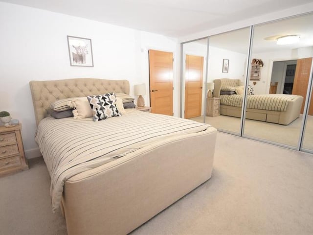 The main bedroom is a lovely, large space, with gorgeous decor and a real sense of luxury. It has its own en suite facilities.