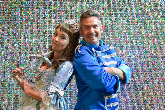 Adam as Buttons alongside Melanie Walters as the Fairy Godmother, in last year's Cinderella at the Palace Theatre.