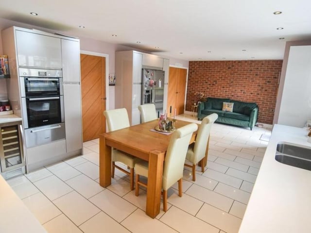 Features in the kitchen'diner include a double oven, warming drawer, ceramic hob, dishwasher and wine cooler.