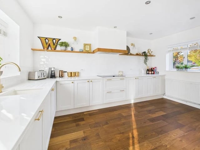 The dining kitchen is a particular wow factor of this home with beautiful shaker style base and larder units, a range of Neff integrated appliances and French Door fridge-freezer (available by separate negotiation). Dual-aspect windows with feature patio doors open directly out onto the patio and garden beyond.