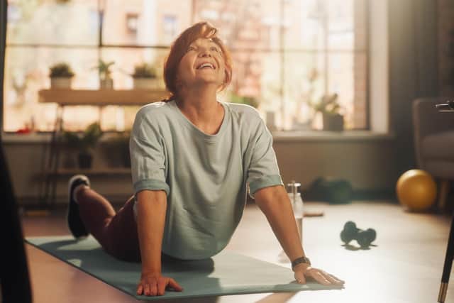 Working out at home can save both time and money (photo: Adobe)