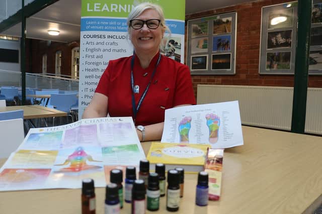 Liz with some of her complementary therapies oils at the college's Chesterfield Road campus.