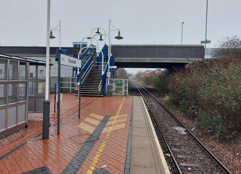 Hucknall Train Station is served by the Robin Hood Line for regional rail services and is also the northern terminus of the Nottingham Express Transit (NET) tram system. The train station has a single platform for the Robin Hood Line, which connects to Nottingham, Mansfield, and Worksop. The tram line extends south to Nottingham city centre.
