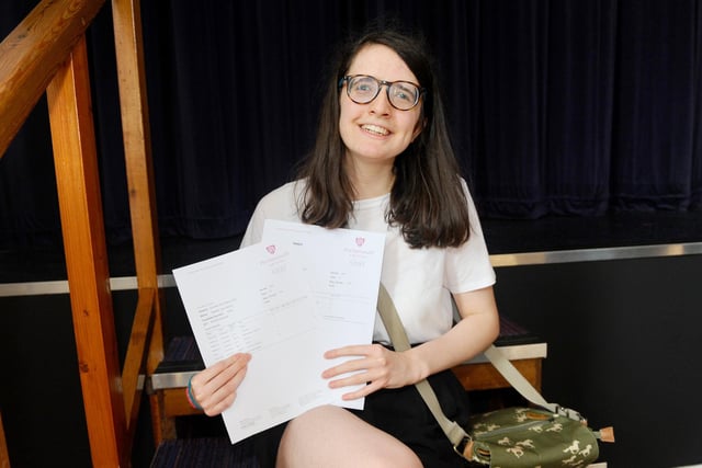 Tilly Barker (16) from Southsea, who got seven 9s and 3 A*s, with her results at Portsmouth High School in Southsea. Picture: Sarah Standing (200820-2907)