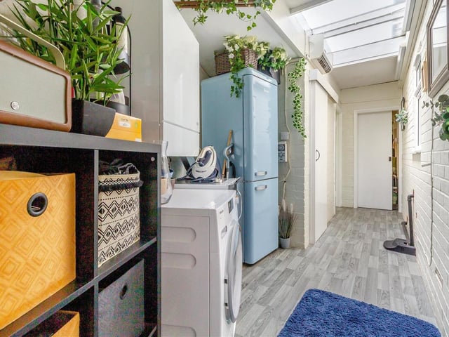 Just off the kitchen is a handy utility room and storage cupboard, where there is plumbing for a washing machine and space for a tumble dryer. The utility room includes a wall-mounted, oil-fired central heating boiler, an overhead heater and further space for a fridge/freezer.