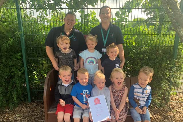 Cherubs Day Nursery at Mansfield Woodhouse celebrated their success with some of the children and staff showing off their certificate