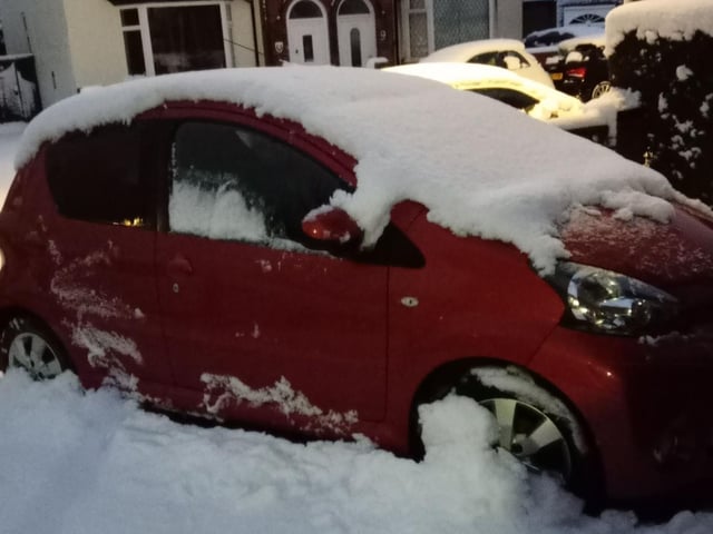 This car in Kirkby Cross looked suitably iced with a healthy covering of snow.