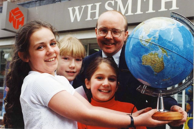 The winners of a Red Nose poetry competition organised by WH Smith. Collecting their trophies from WH Smith manager Ian Hudspith are Rachel Smith, Michelle Shotton and Clare Alaige.
