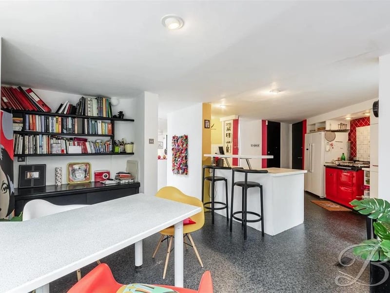 These interconnected spaces flow effortlessly into one another, offering a sense of depth and intrigue.