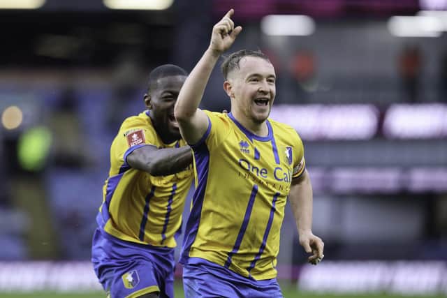 Louis Reed celebrates his winner during the Emirates FA Cup fourth round match against Burnley FC at Turf Moor, 14 Feb 2026, Photo credit Chris & Jeanette Holloway / The Bigger Picture.media