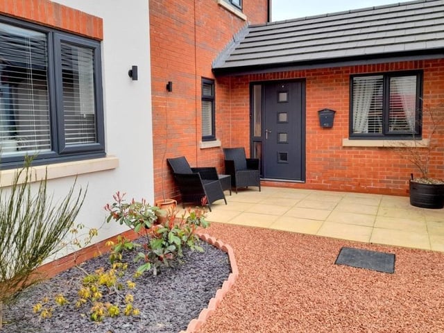 A pleasant seating area at the front of the house. Have a minute with a cup of coffee or glass of wine.
