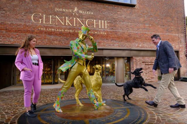 Ramsay Borthwick, Distillery Manager and his dog Skyelar mark the opening of the new Glenkinchie Distillery visitor experience in East Lothian, by unveiling a new Striding Man statue featuring historic distillery dog, Bruce. He is joined by Edinburgh-based artist Angela Johnston, who created the statue design.