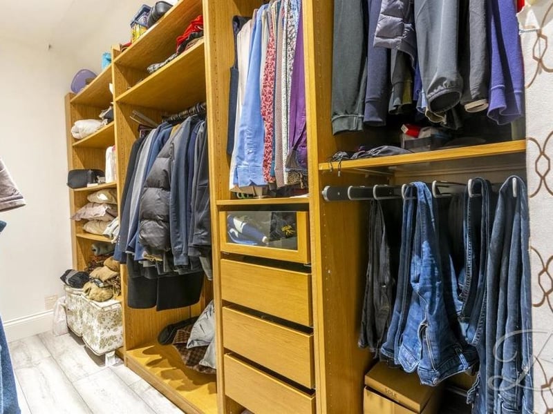 As well as a walk-in shower, there's a walk-in wardrobe attached to bedroom number two. No more worries about where to keep all those clothes!