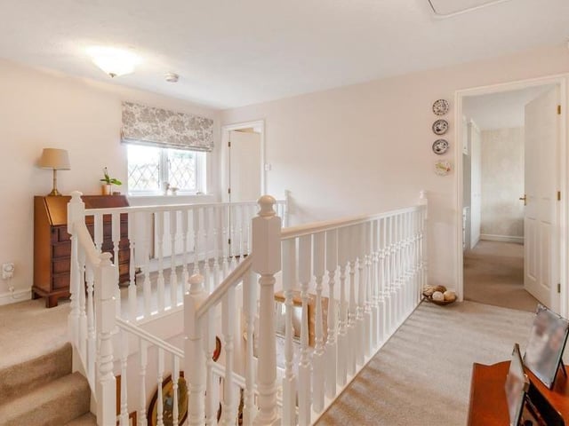 The staircase leads to this galleried landing on the first floor. Not only does it steer you towards the five bedrooms and the family bathroom, it also has a loft hatch and an airing cupboard housing the hot-water cylinder.