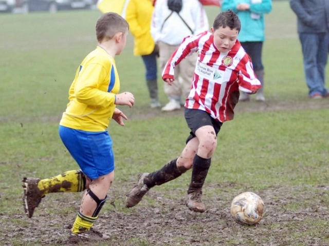Robin Hood Colts (red and white stripes) v Woodhouse Colts U9s pictured at the Sherwood Fields ground in Edwinstowe in 2011