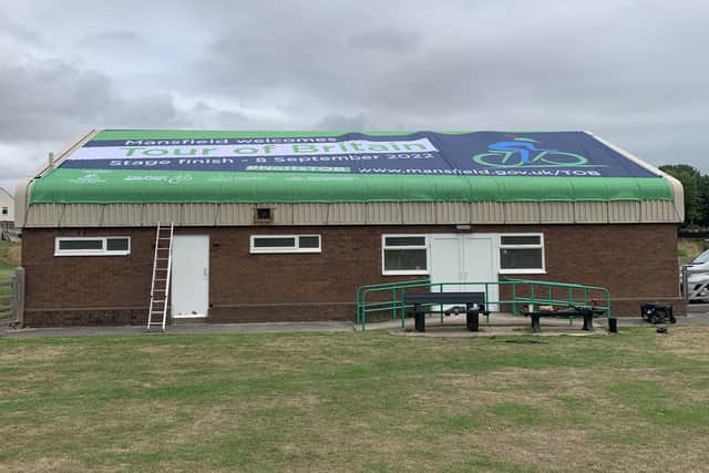 Tour of Britain banner on top of the cricket pavilion in Chesterfield Road South, Mansfield