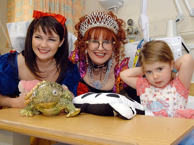 In 2006 stars of Mansfield's pantomime Snow White visited young patients at the King's Mill Centre. Three-year-old Ellie McBroom from Shirebrook met stars Sue Pollard and Hollie Taylor, who plays Snow White.