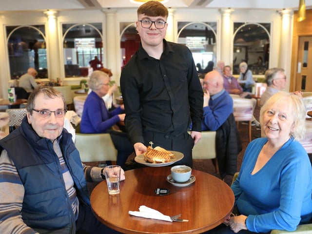Joe Bettey served guests Robert and Lorna Newton from Peterborough