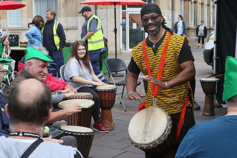 A drumming workshop in the town centre.