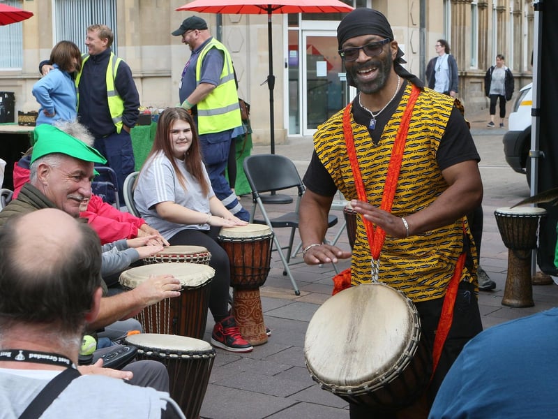 A drumming workshop in the town centre.